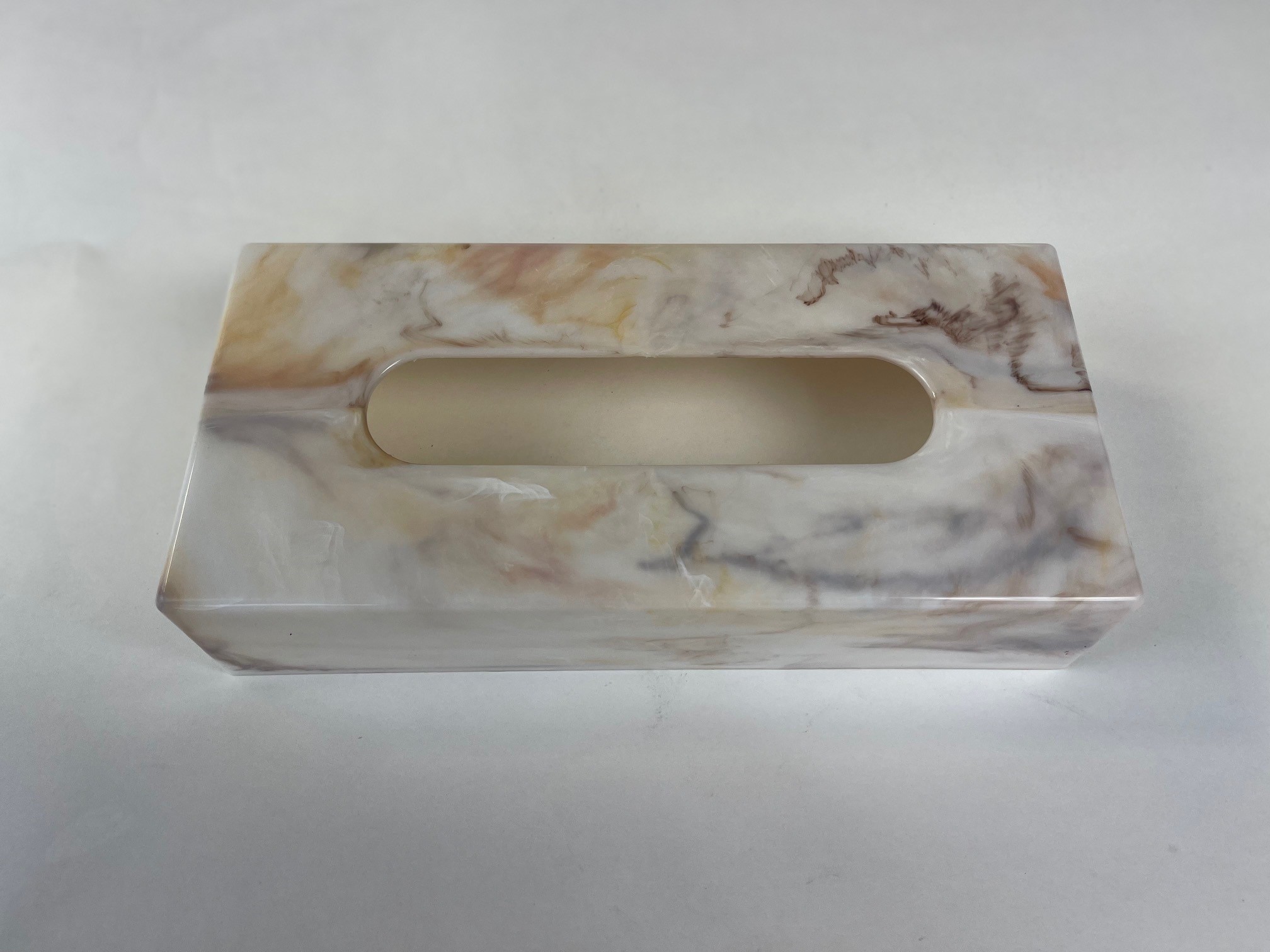 FACIAL TISSUE DISPENSER/COVER PLASTIC WITH MARBLE DESIGN Free-standing on counter top. **limited to stock on hand**